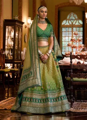 Affectionate Green Bridal Lehenga Choli with Sparkle & Mirror Work in Smooth Rajwadi Silk