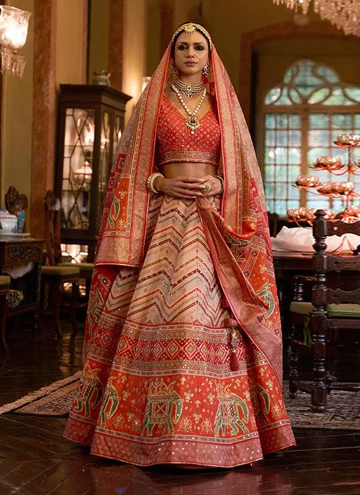 Affectionate Orange Bridal Lehenga Choli with Sparkle & Mirror Work in Smooth Rajwadi Silk